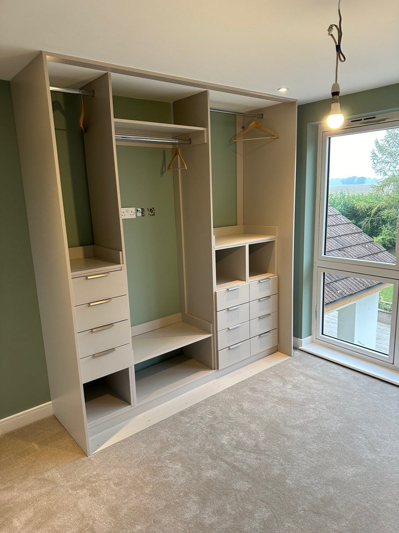 Customised wardrobe with bespoke shelving and hanging space