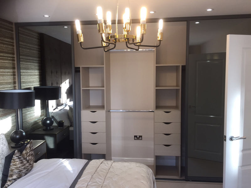 Origin Aurora Graphite wardrobe Frame with sliding wardrobe Mirror Doors. 2 x Axis 4 Drawer Interior Systems.