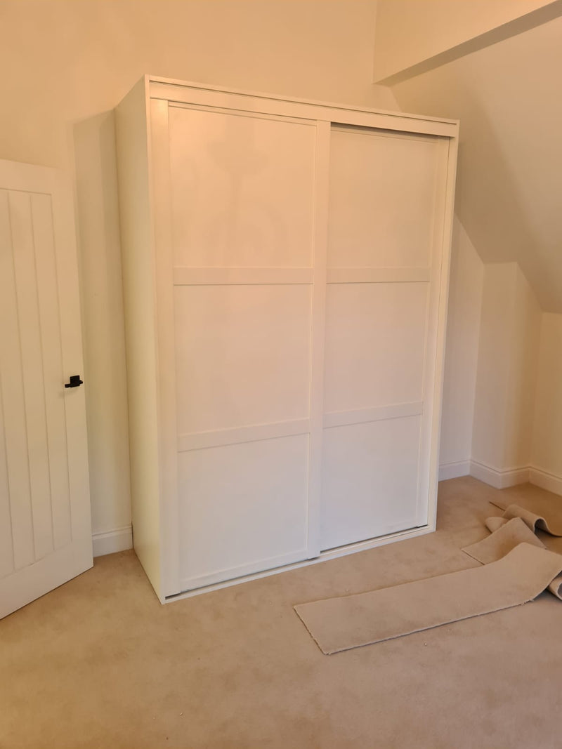 Define Sliding Wardrobe System with White Frame with 2 Split Panel Wardrobe Doors and End Panels