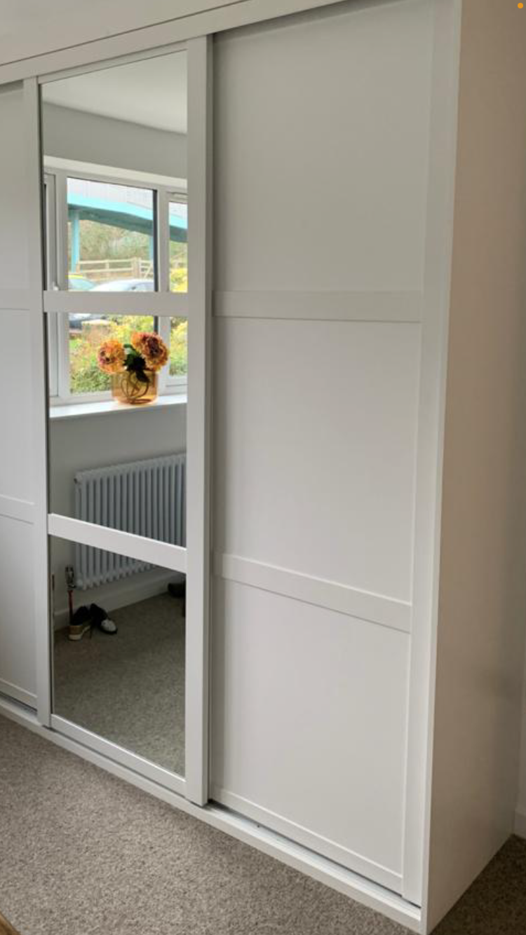Shaker Steel Sliding Wardrobe System with White Frames, 3 x three- part horizontal doors, 2 x White Board Doors & 1 x Silver Mirror door